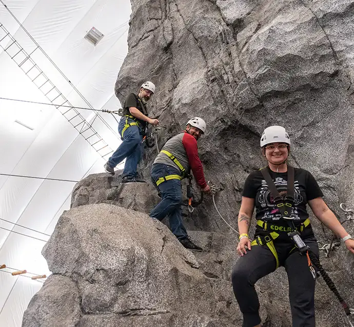 Team on the climbing wall